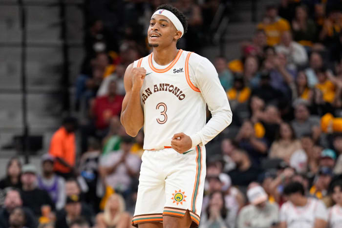 Nov 17, 2023; San Antonio, Texas, USA; San Antonio Spurs forward Keldon Johnson (3) reacts during the first half against the Sacramento Kings at Frost Bank Center.